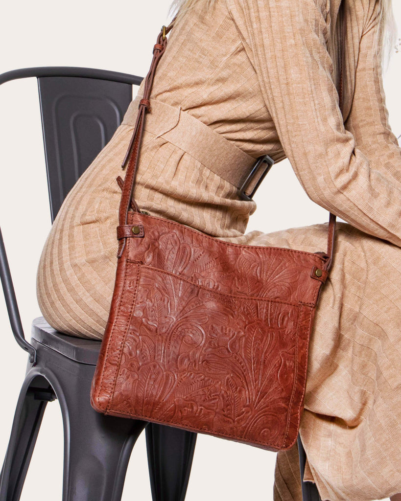 Evansville Flat Crossbody - brandy tooled lifestyle
